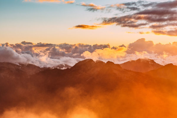 Stock image of a mountain range at sunset