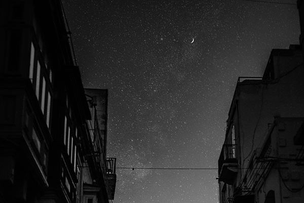 Stock image of a city sky at night in black and white