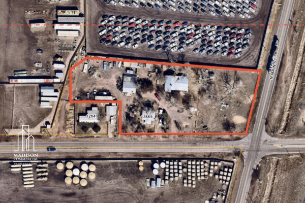 Aerial property view showing a red outline around the parcel