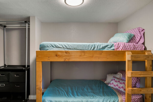 Interior image of 1743 Miner showing bunk beds in one of the bed rooms